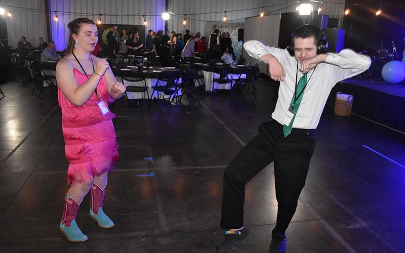 Morgan Ward and Jacob Poole got the party started with their epic dance moves as the crowd was filtering in from the red carpet and makeup stations. MATTHEW OSBORNE/Staff