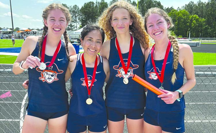 The Lady Raider 4x800 relay team of (from left) Abigail Hotard, Dulce Rojas, Ember Ivester and Audrey Hotard finished first Saturday. SUBMITTED