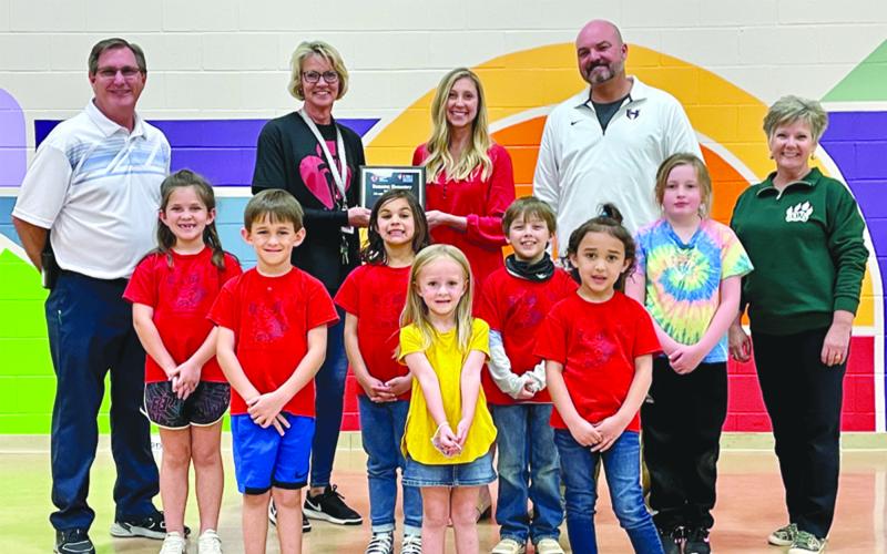 Demorest Elementary School students who raised $500 or more include (front row, from left) Charlie Hastie, Amelia Quaife and Aubrey Davis. Middle row are (from left) Helena Hastie, Olivia Holbrook, A.J. Beach and Braelin Sipes. Back row are (from left) David Gailer (Asst. Principal at DES), Erna Dowdy (P.E. Teacher at DES), Holly Marbut (Youth Market Director, American Heart Association), Superintendent Matthew Cooper and Demorest Principal Connie Yearwood.